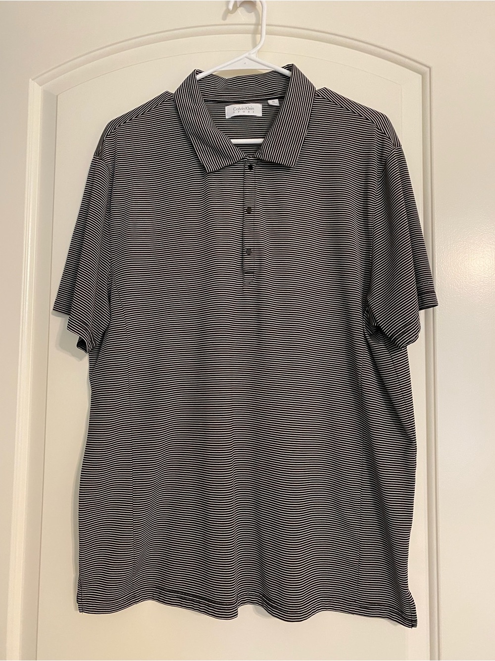 Calvin Klein Men’s Black & White Striped Polo Shirt